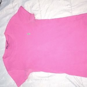 Dark pink polo shirt (light pink due to lighting)